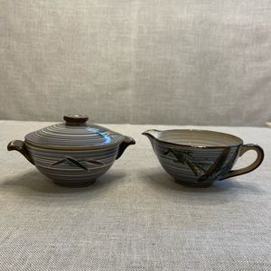 UCAGO porcelain creamer and sugar bowl.